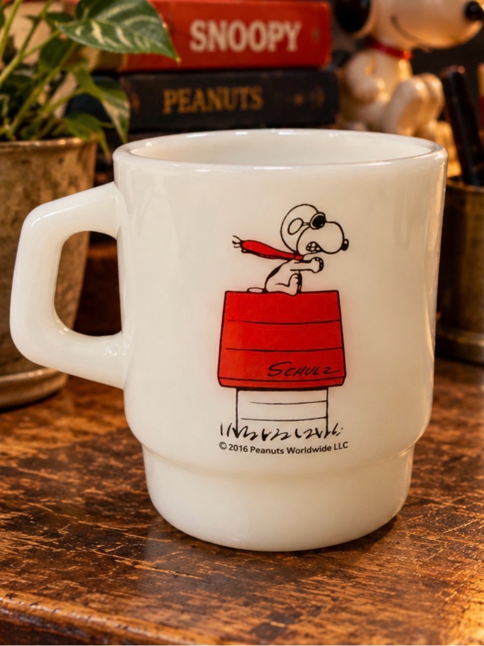 Peanuts White Ceramic Mug with Red Doghouse and Snoopy Graphic